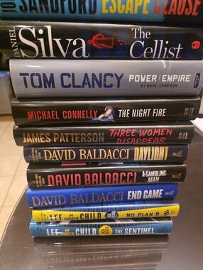 Stack of 10 Hardcover Thriller Books with Bold Spine Colors. Like New.